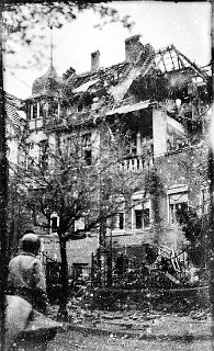 This may have been the house in Neuss, Germany where  Brusveen's company was bivouacked the night it was shelled.  He was slightly wounded and his friend Thomas Apesos was killed.